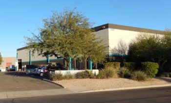 Sales of an industrial building, piece of land, highlight recent closings by NAI Horizon