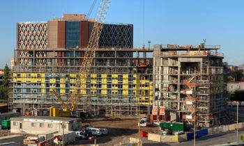 Mortenson celebrates construction progress with 1st “Topping Out” in Novus Innovation Corridor