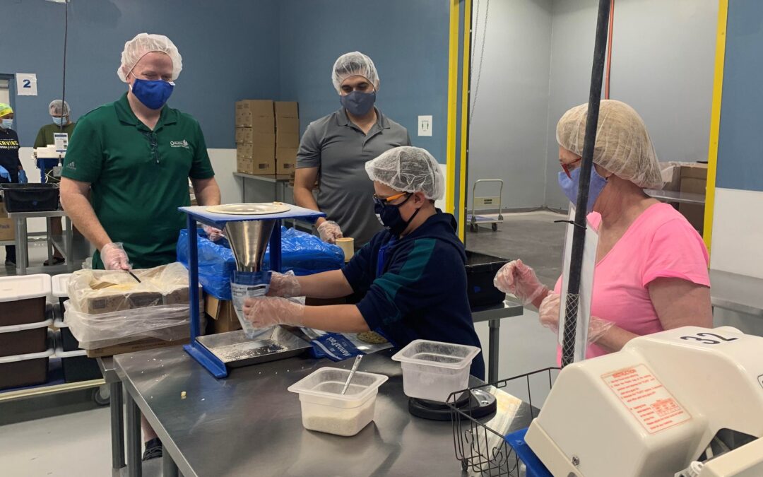 Central Arizona CCIM chapter opens up, gives back to community at Feed My Starving Children