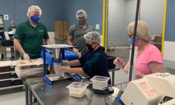 Central Arizona CCIM chapter opens up, gives back to community at Feed My Starving Children
